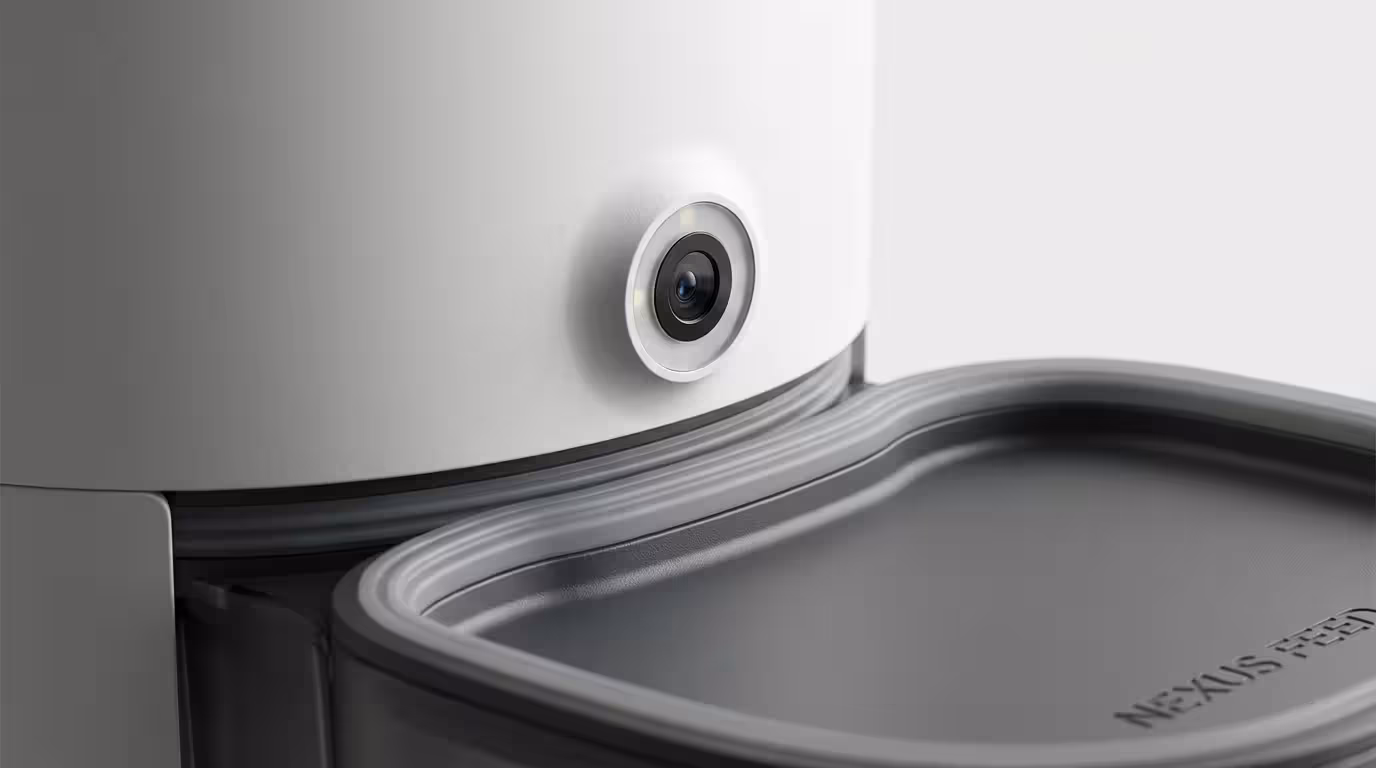 Close-up of a smart pet feeder camera and airtight lid.
